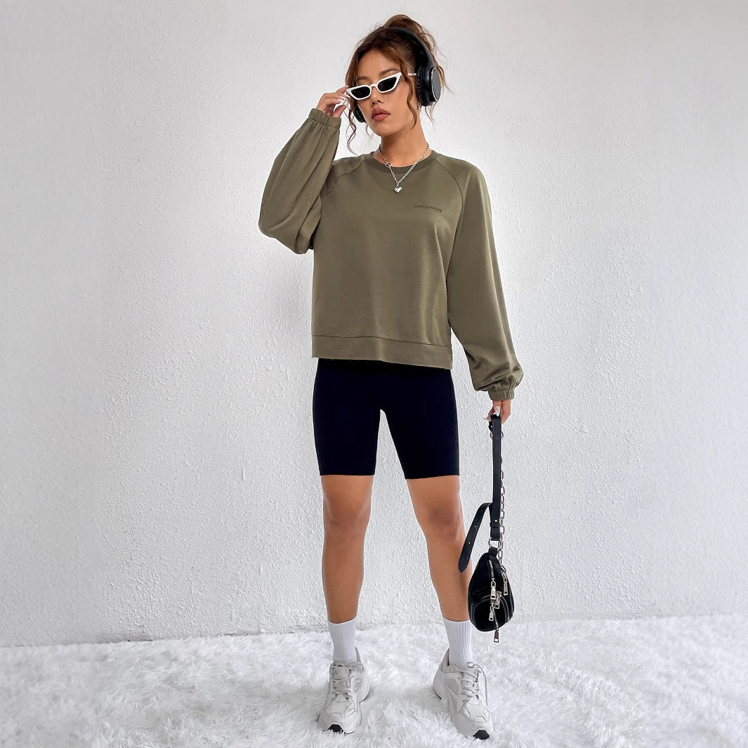 Kvinders afslappede raglan sweatshirts med elastiske manchetter og minimalistisk design Stilla