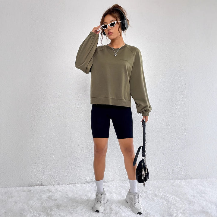 Kvinders afslappede raglan sweatshirts med elastiske manchetter og minimalistisk design Stilla