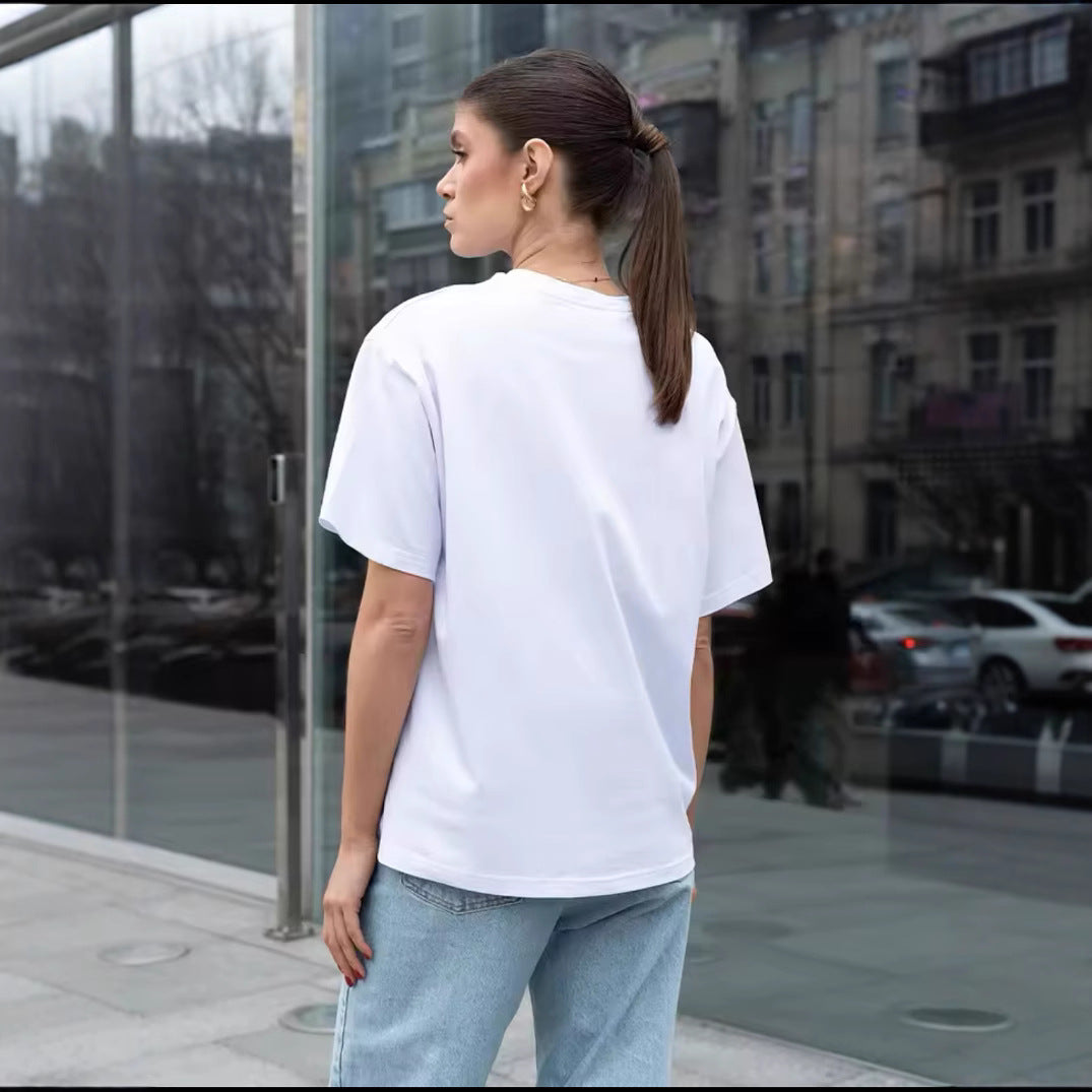 Dame Oversized T-shirt med kreativ tekst og afslappet snit Stilla