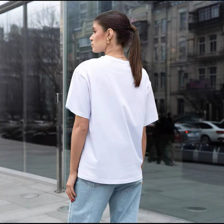 Dame Oversized T-shirt med kreativ tekst og afslappet snit Stilla