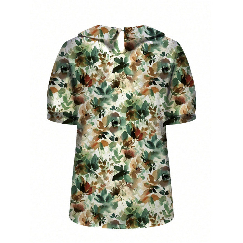 Dame kortærmet bluse med florale accenter og klassisk krave Skovae