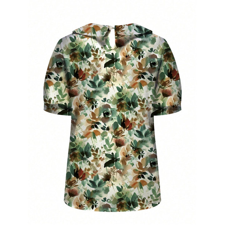 Dame kortærmet bluse med florale accenter og klassisk krave Skovae