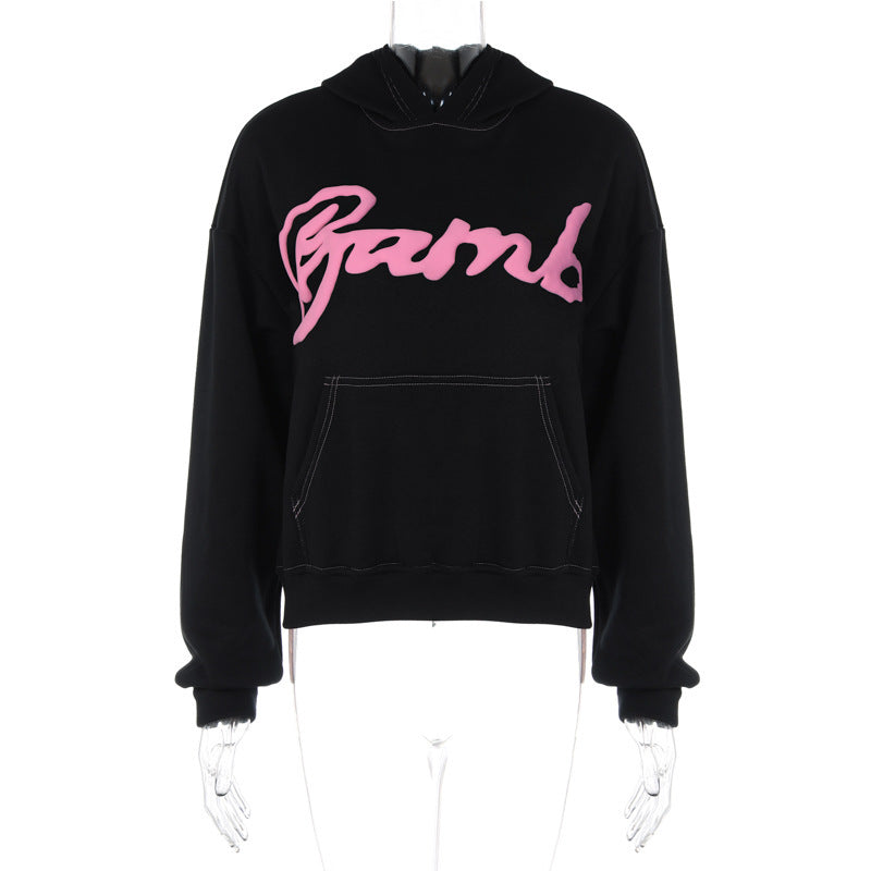 Dame Oversized Hoodie med stilfuld skrift og praktisk kængurulomme Stilla