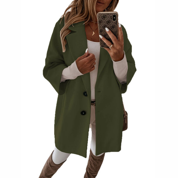 Dame oversized lang jakke med elegante knapdetaljer og afslappet snit Stiila