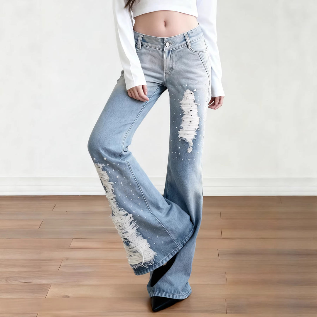 Dame Schlagjeans med moderigtige destroyed-detaljer og komfortabel pasform Skovae