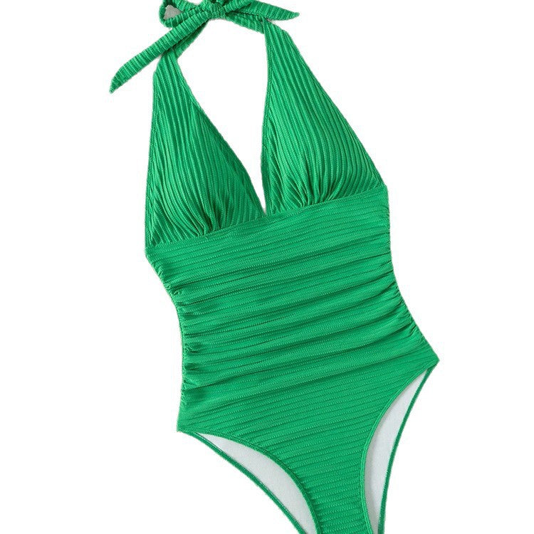 Dame jumpsuit badedragt med dyb V-udskæring og elegante ribbede detaljer Skovae