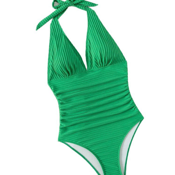 Dame jumpsuit badedragt med dyb V-udskæring og elegante ribbede detaljer Skovae