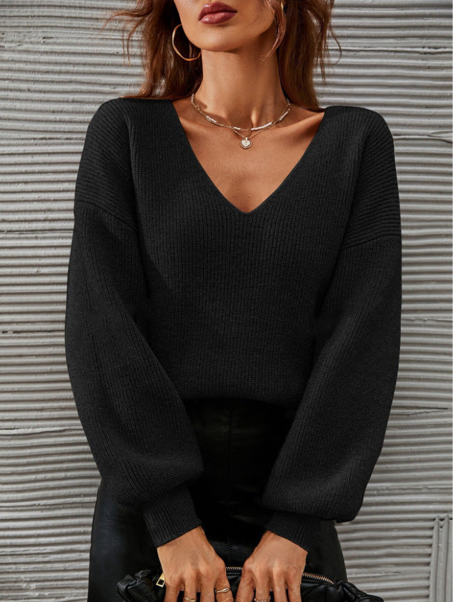 Damer V-hals sweater med en afslappet pasform og fashionable ballon ærmer Stilla