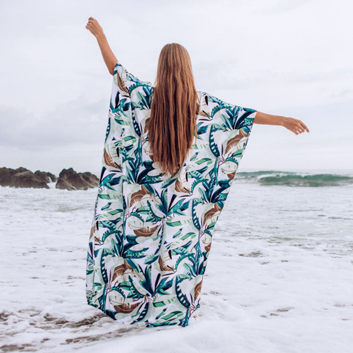 Dame strandkaftan med blomstermotiv og luftig pasform Stilla