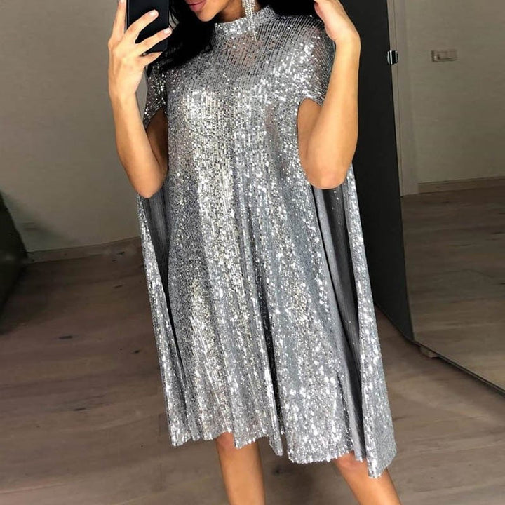 Dame aftenkjole med glitrende cape-snit og glamourøse pailletter stil