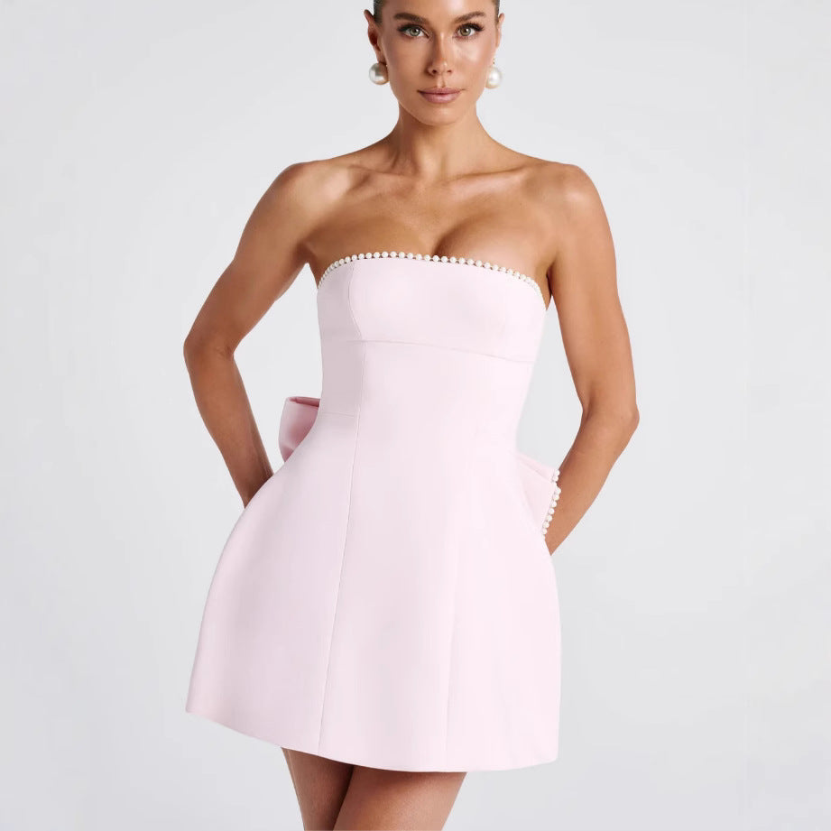 Dame minikjole med elegant bustier-overdel og trendy ruffle-detaljer Stilla