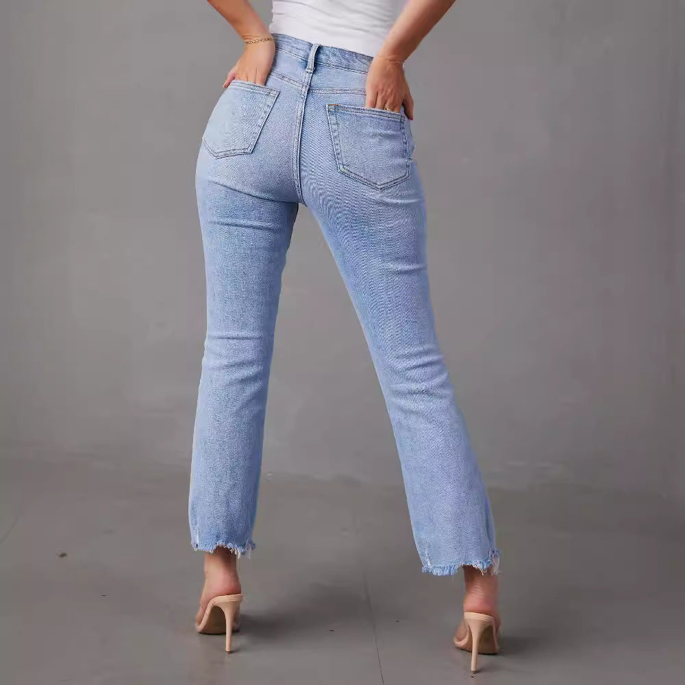 Damejeans med høj talje med trendy frynser og slidte detaljer Skovae