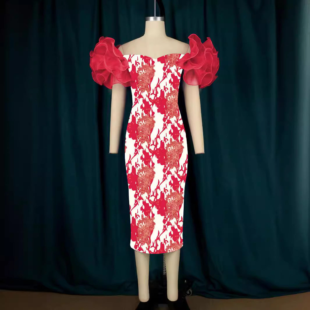 Dame Elegante Midi-Kjole med innovative puffærmer og kunstnerisk tryk Skovae