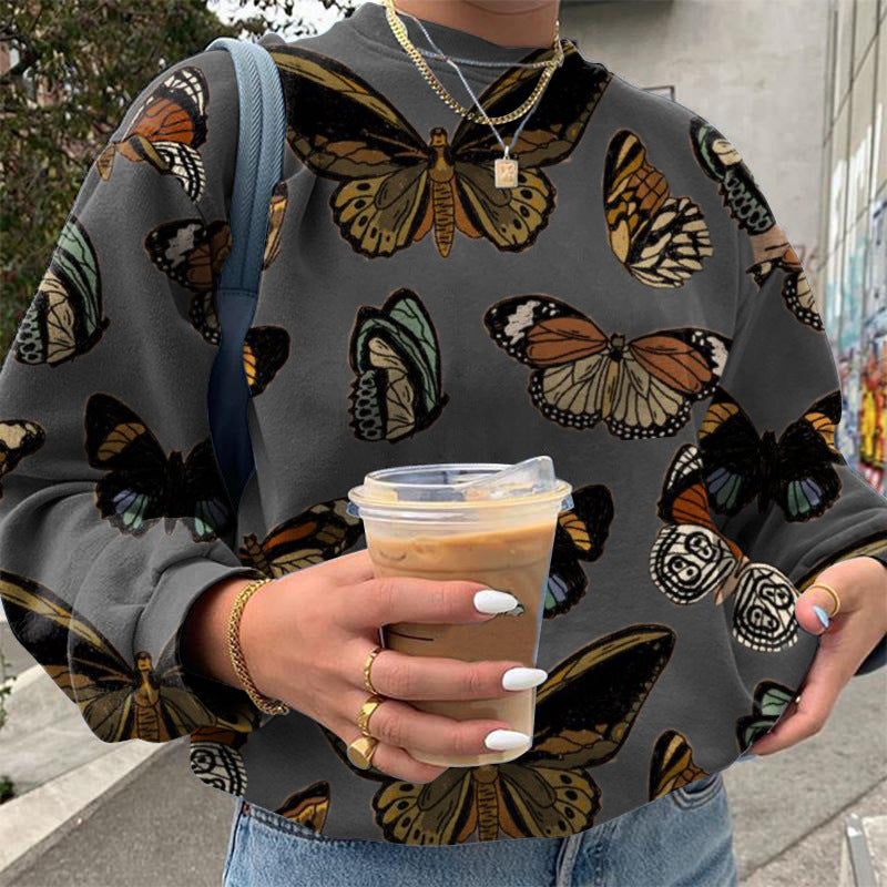 Dame sweatshirt med kreativ sommerfuglemotiv og afslappet snit Stilla