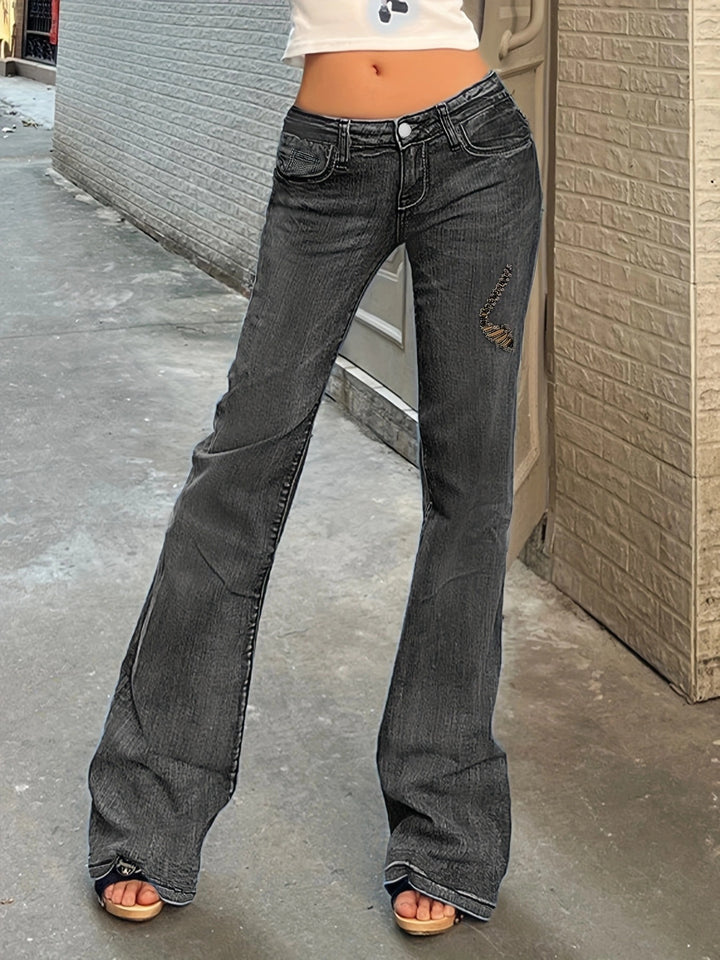 Dame Bootcut Jeans med modevask og kreative revnedetaljer Stilla