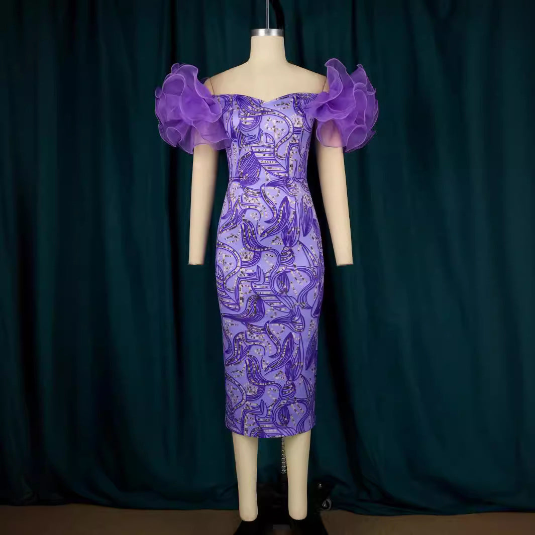 Dame Elegante Midi-Kjole med innovative puffærmer og kunstnerisk tryk Skovae