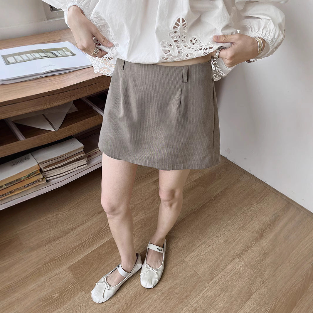 Dame moderigtig høj talje nederdel med elegant silhuet og praktiske lommer Stilla