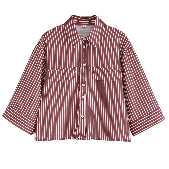 Dame stribet bluse med oversized pasform og praktiske lommer Stilla