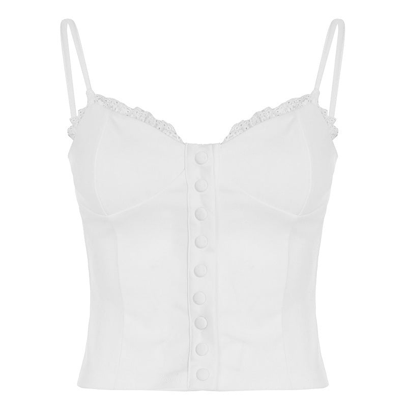 Damebluse med spidsbroderi og dekorative knapdetaljer Skovae
