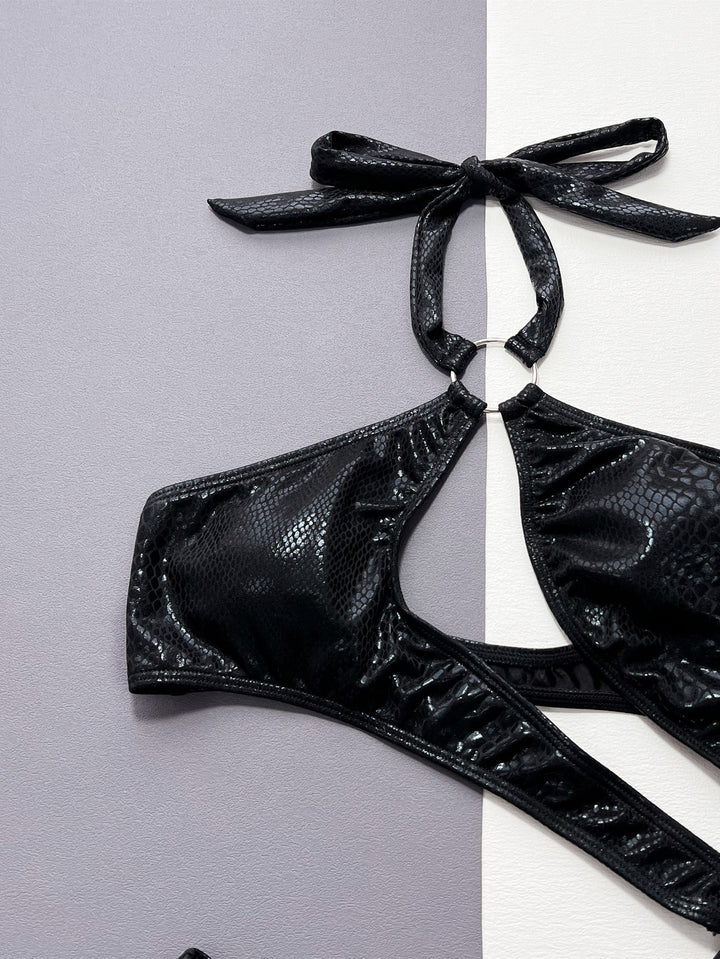 Dame Cut-Out Badedragt med spændende ringdetalje og skimrende design Stilla