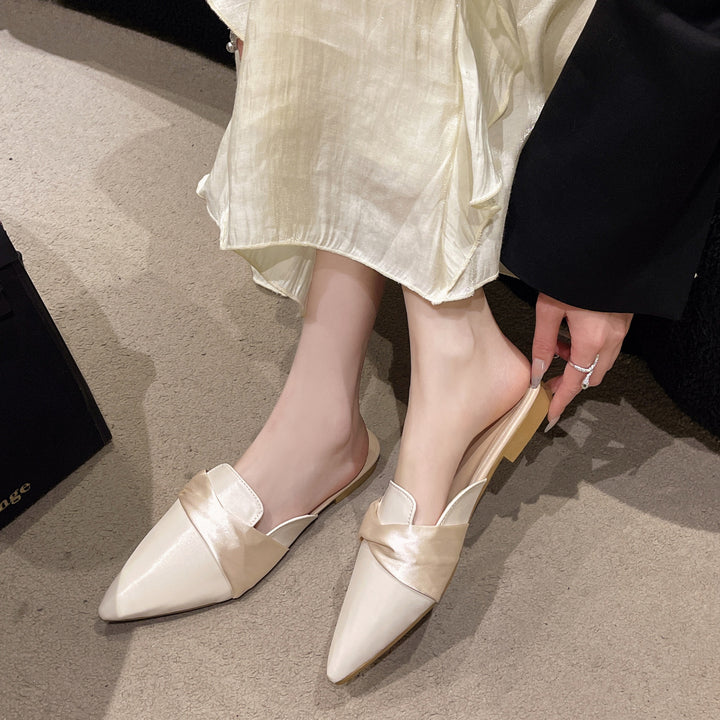 Dame klassiske slippers med smart sløjfeaccent og fint overmateriale Stilla