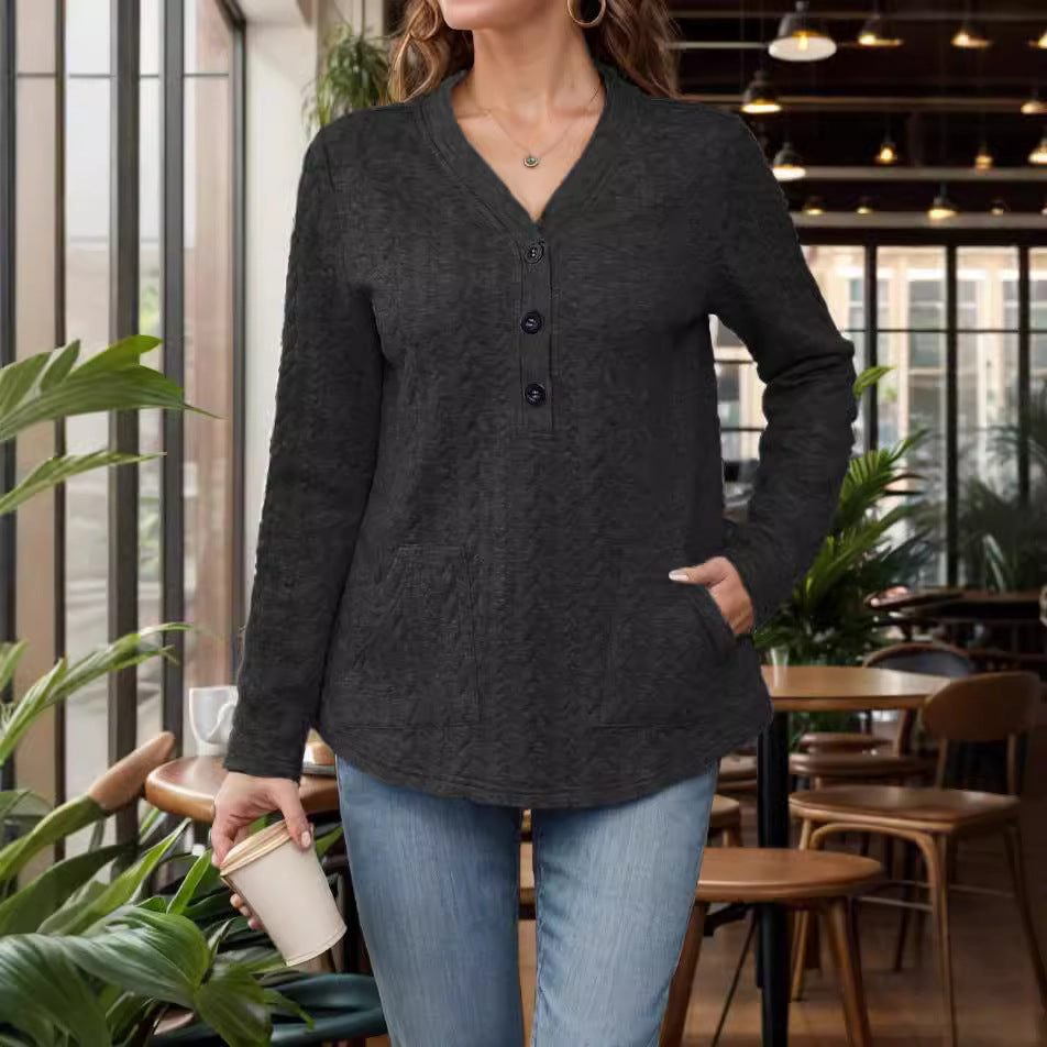 Dame Langærmet top med knapdetaljer og praktisk lomme design Stilla