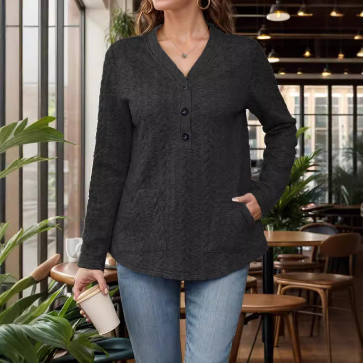 Dame Langærmet top med knapdetaljer og praktisk lomme design Stilla