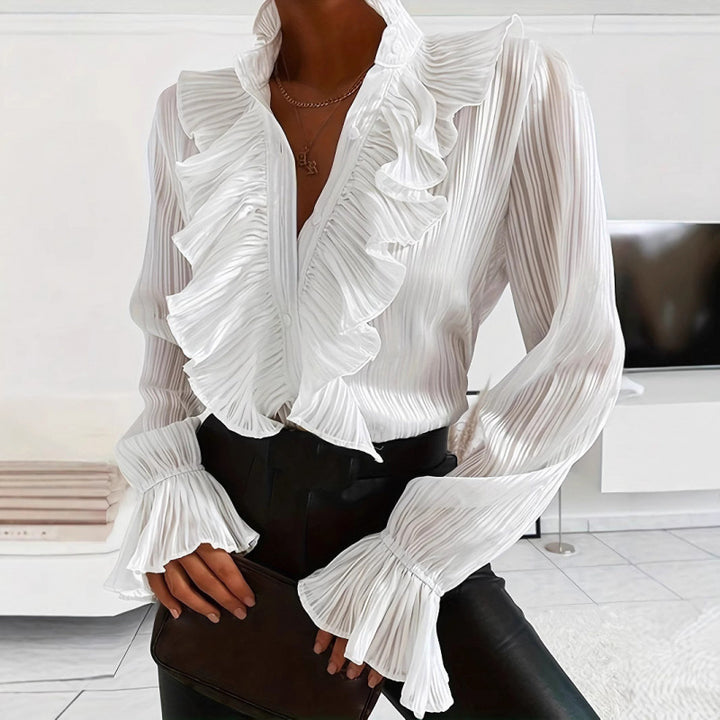 Dame Plisseret Bluse med flæsedetaljer og elegante volanger Skovae