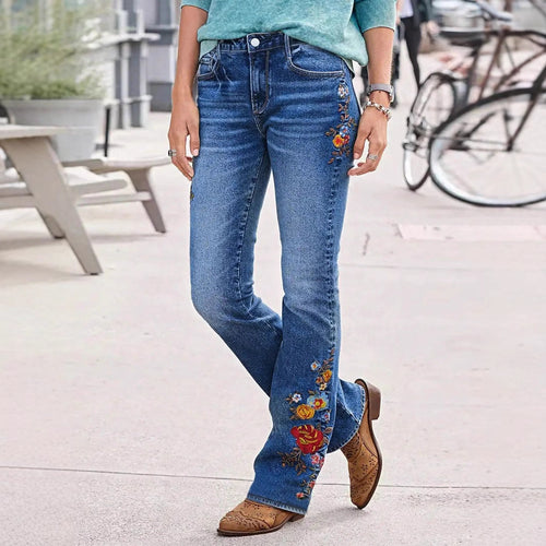 Damejeans med blomsterbroderier og vidde ben Stilla