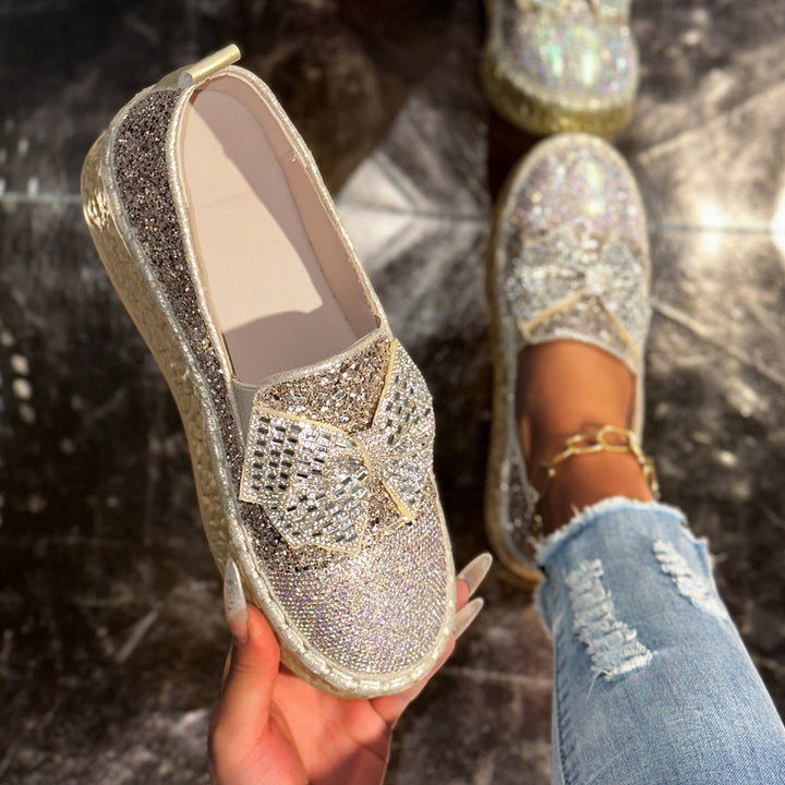Dame Glitrende Slip-Ons med dekorativt sløjfedetalje og en raffineret jute-sål Stilla