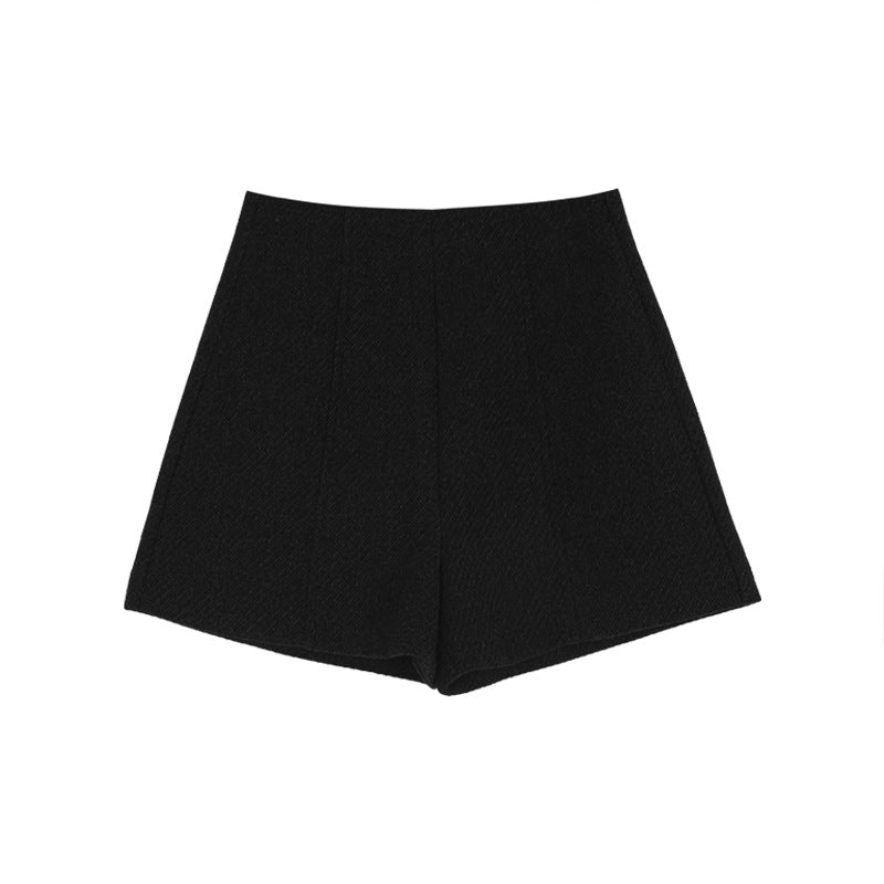 Dame shorts i det elegante houndstooth-mønster med høj talje og folder Stilla