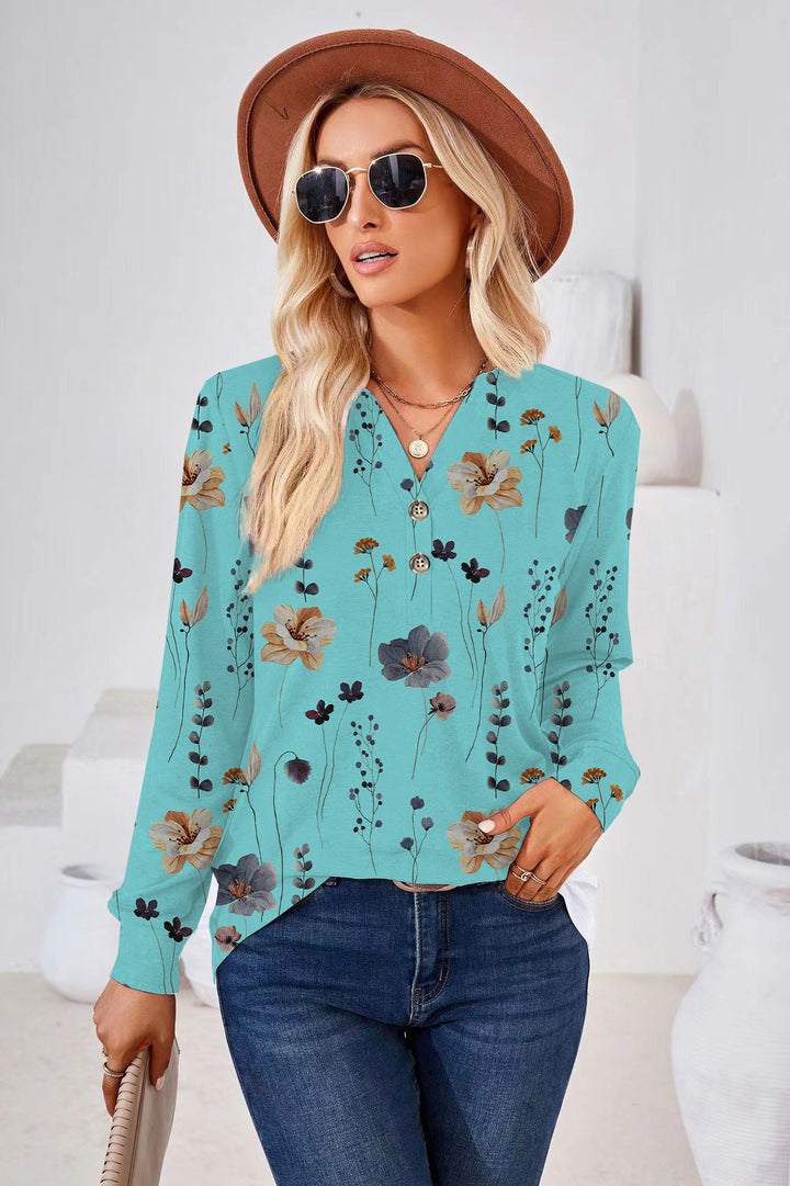 Damebluse med blomstret design og knapliste Stilla
