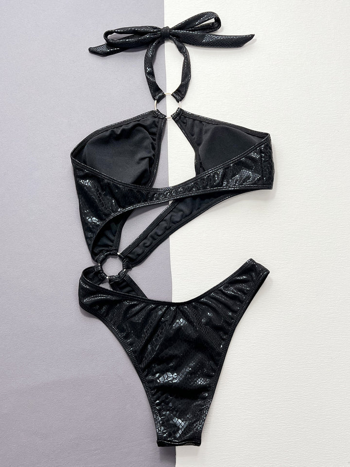 Dame Cut-Out Badedragt med spændende ringdetalje og skimrende design Stilla