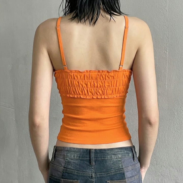 Dame top med elastisk flæsedetalje og fashionable knapper Skovae