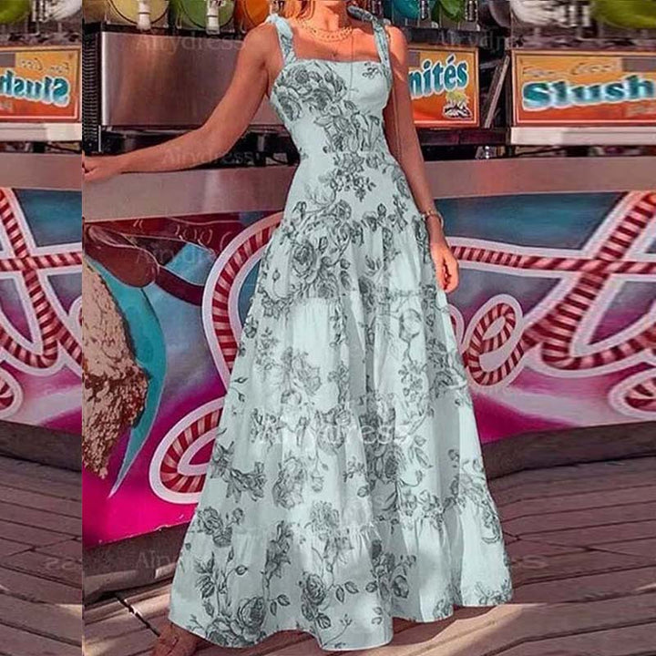 Dame Maxikjole med romantisk blomsterprint og svajende skirt Stilla