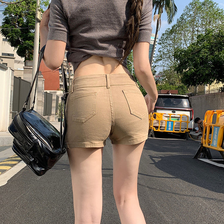 Dame mode shorts med knapdetaljer og høj talje snit Stilla