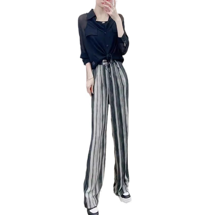 Damer Legesyg Chiffonbluse med gennemsigtige ærmer og elegant indpakningslook Stilla