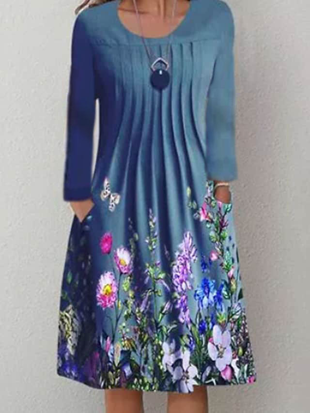 Dame fritidskjole med blomstret design og lommer Stilla
