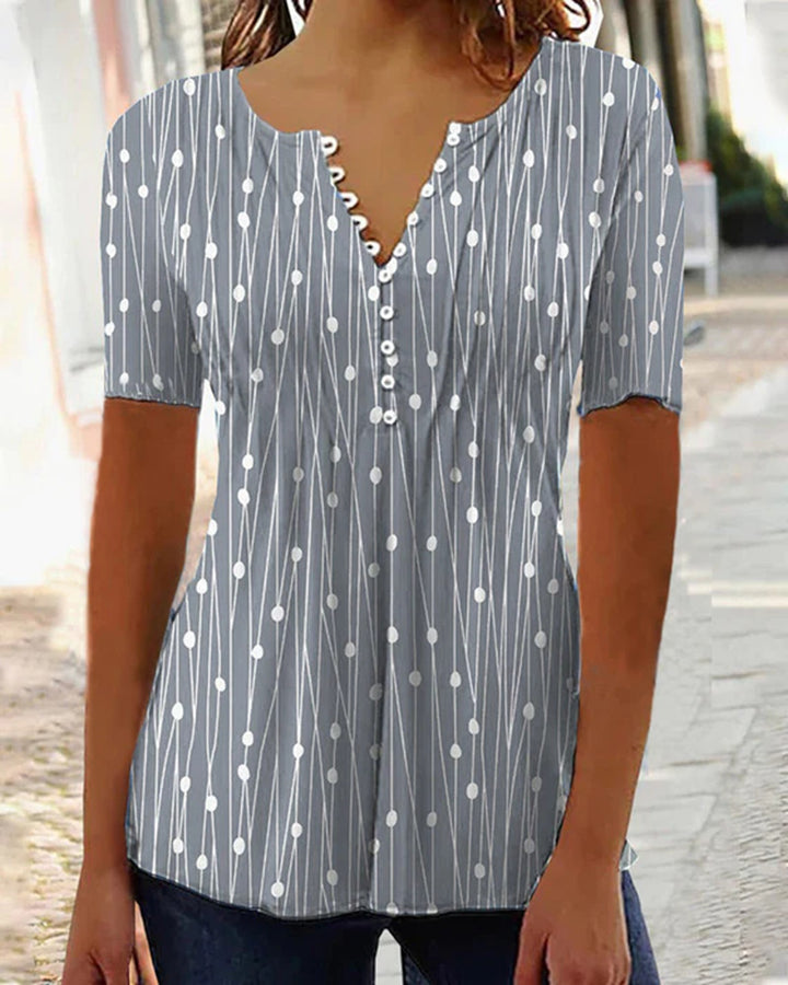 Dame kortærmet bluse med dekorativt knapdesign Stilla
