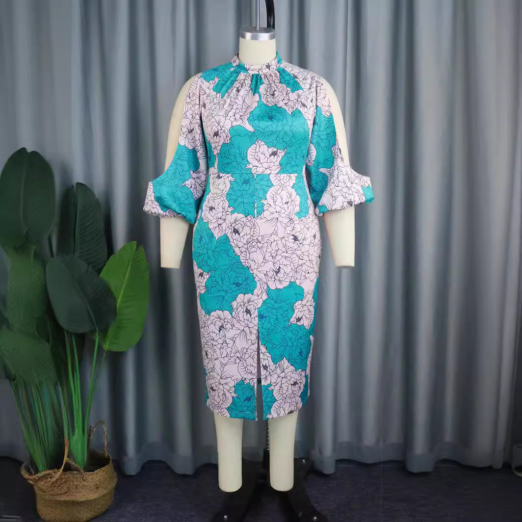 Dame elegant wrap dress with floral pattern and trendy cut-out sleeves Skovae