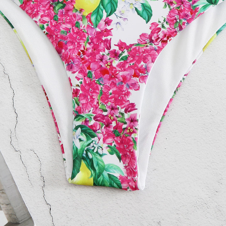 Dame heldragt badedragt med romantiske sløjfer og blomsterdesign Stilla
