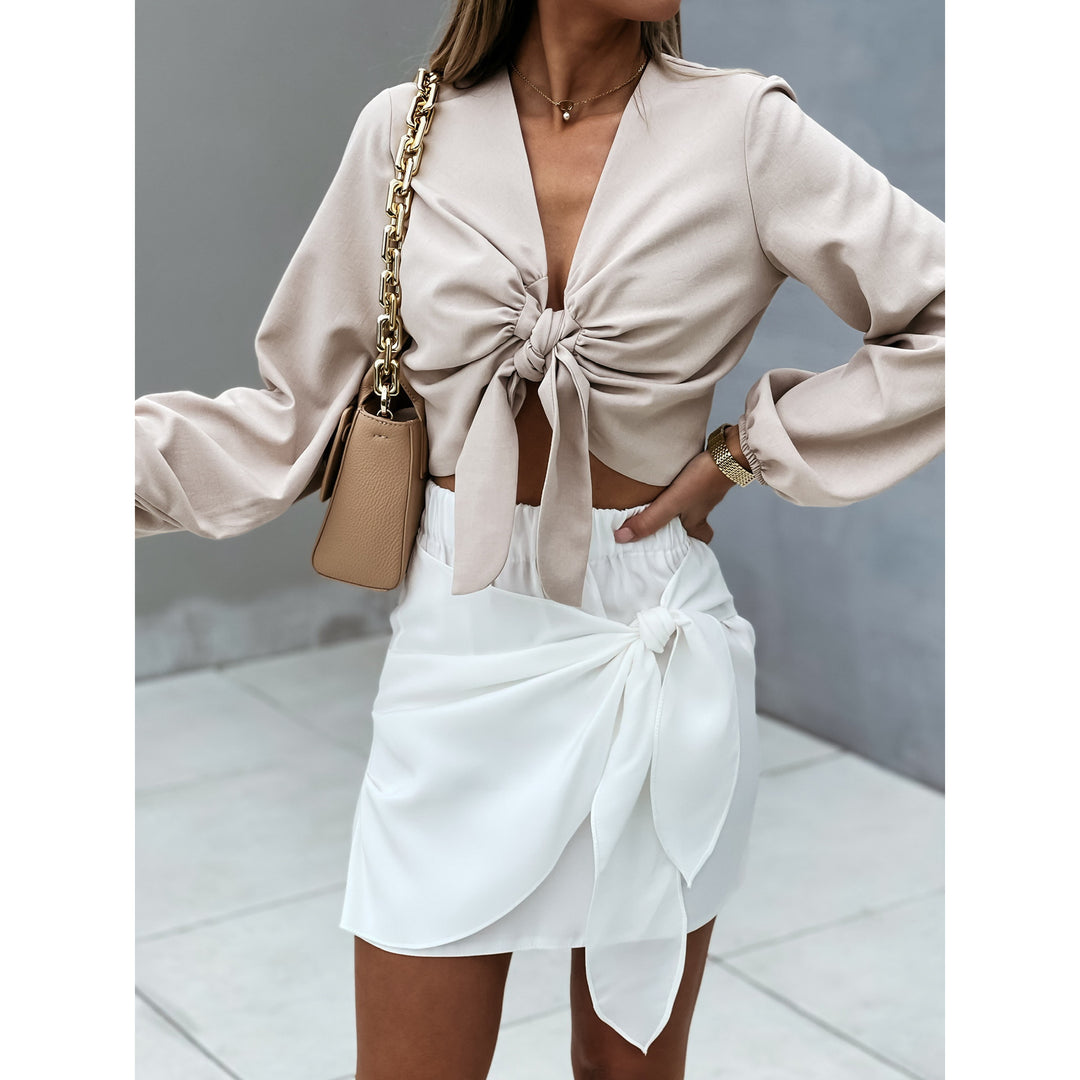 Damer Cropped Bluse med dekorativ knude og vidte ærmer Stiila