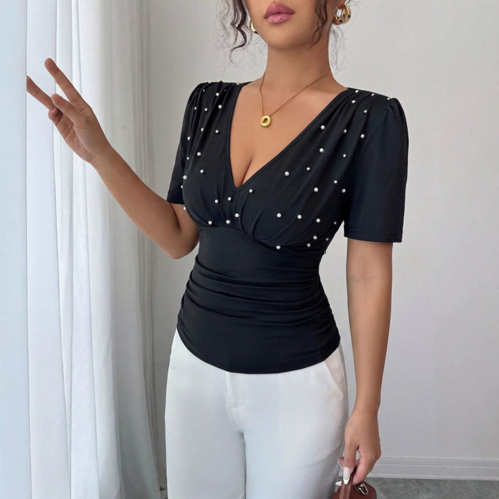 Dame elegant bluse med perle-detalje Skovae