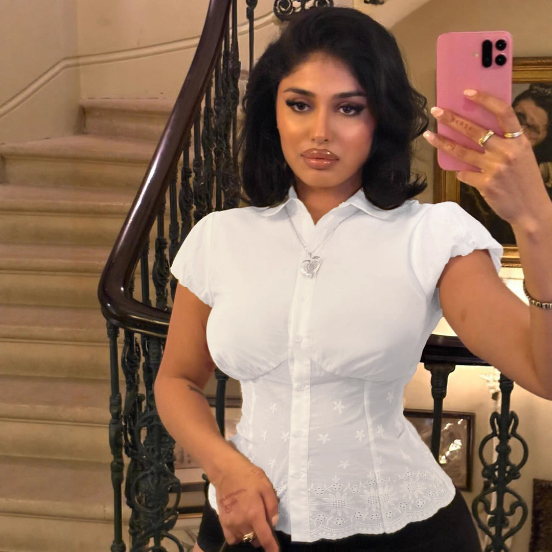 Damebluse med elegant spidsudsmykning og puffærmer Skovae