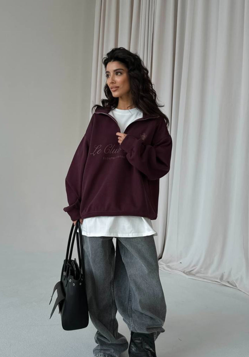 Kvinders afslappede pullover med halv lynlås og grafisk print Stilla