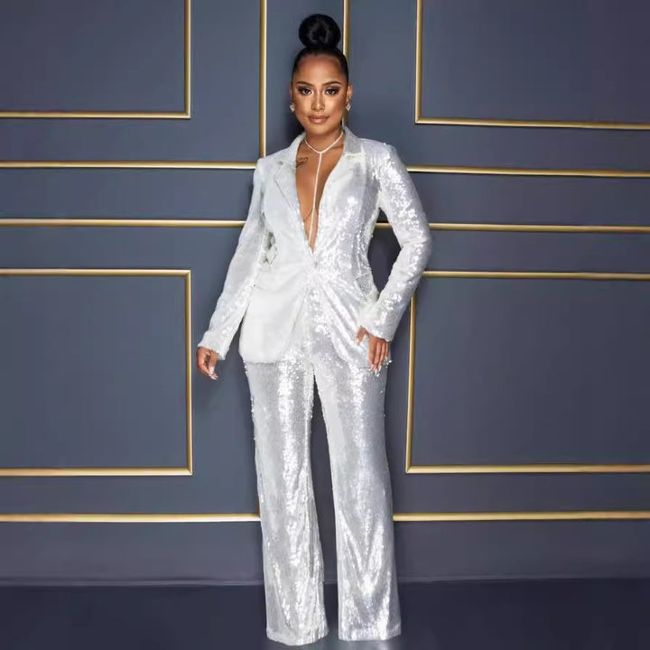 Dame Glitterende Jumpsuit sæt med tætsiddende silhuet og glitrende detaljer Stilla
