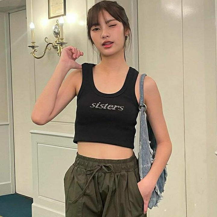 Dame Crop Top med glitrende design Stilla