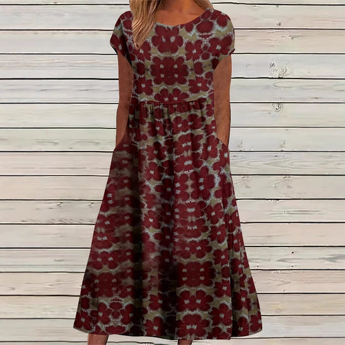 Dame Maxikjole med legende blomsterdesign og praktiske sidelommer Stilla