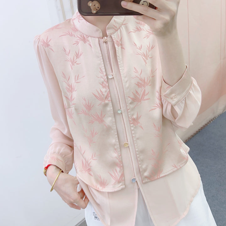 Damebluse med blomsterdesign og elegant krave Stilla