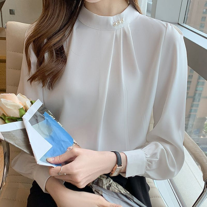 Damer elegant bluse med flæse detaljer og stilfuld krave Stilla